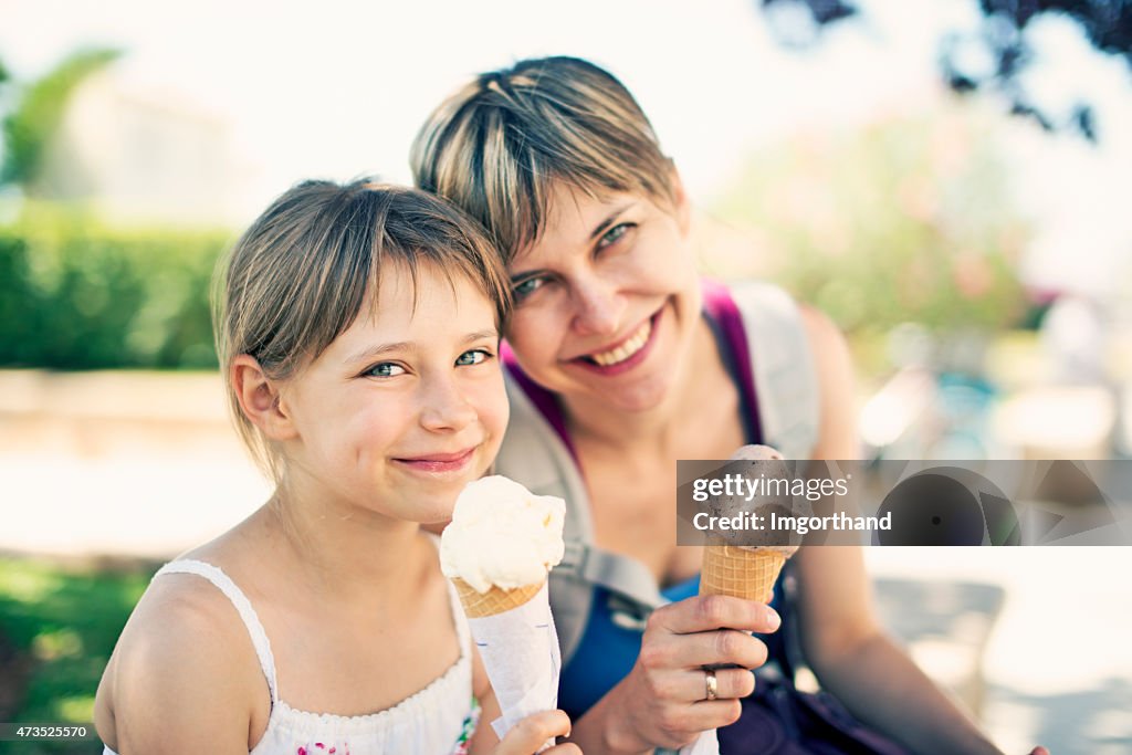Mother and daughter eating ice cream