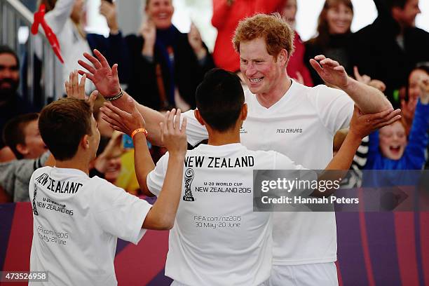 Prince Harry celebrates after scoring the winning goal on the final buzzer as he captains the New Zealand team playing the All Stars in a five a side...