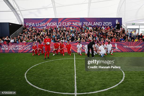 Prince Harry talks to his team as he captains the New Zealand team playing the All Stars in a five a side game of football to promote FIFA Under 20...