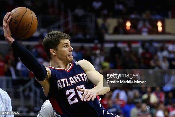 Kyle Korver of the Atlanta Hawks saves a ball from going out of bounds during the second half against the Washington Wizards at Verizon Center on May...