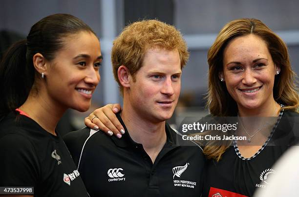 Prince Harry poses with Silver Ferns Maria Tutaia and Catherine Latu at the AUT Millenium Institute on May 16, 2015 in Auckland, New Zealand. Prince...