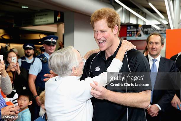 Prince Harry is hugged as he leaves the AUT Millenium Institute on May 16, 2015 in Auckland, New Zealand. Prince Harry is in New Zealand from May 9...