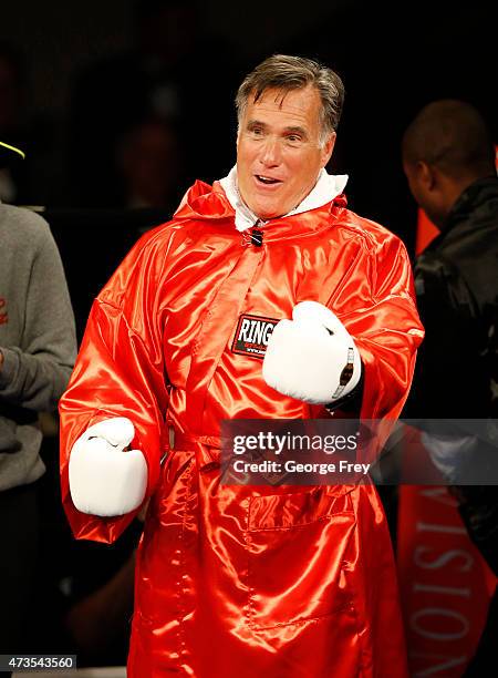 Mitt Romney taunts Evander Holyfield before a charity boxing event on May 15, 2015 in Salt Lake City, Utah. The event was held to raise money for...