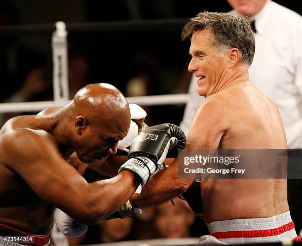 Mitt Romney and Evander Holyfield fight in a charity boxing event on May 15, 2015 in Salt Lake City, Utah. The event was held to raise money for...