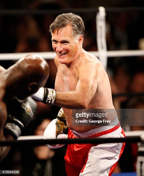 Mitt Romney and Evander Holyfield fight in a charity boxing event on May 15, 2015 in Salt Lake City, Utah. The event was held to raise money for...