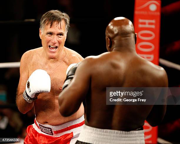 Mitt Romney and Evander Holyfield fight in a charity boxing event on May 15, 2015 in Salt Lake City, Utah. The event was held to raise money for...
