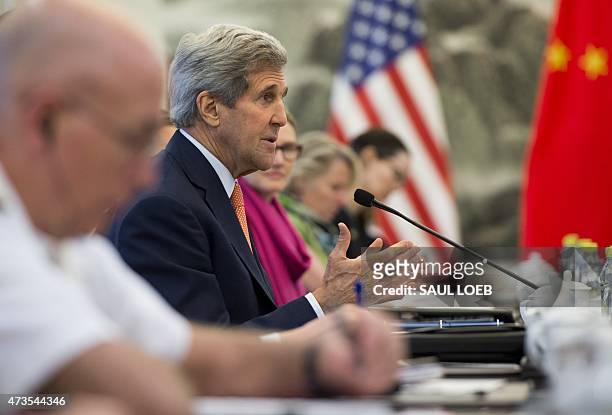 Secretary of State John Kerry speaks during a meeting with Chinese Foreign Minister Wang Yi at the Ministry of Foreign Affairs in Beijing on May 16,...
