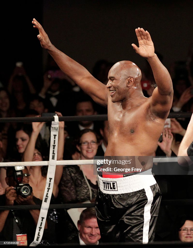 Mitt Romney Takes On Evander Holyfield In Charity Boxing Event