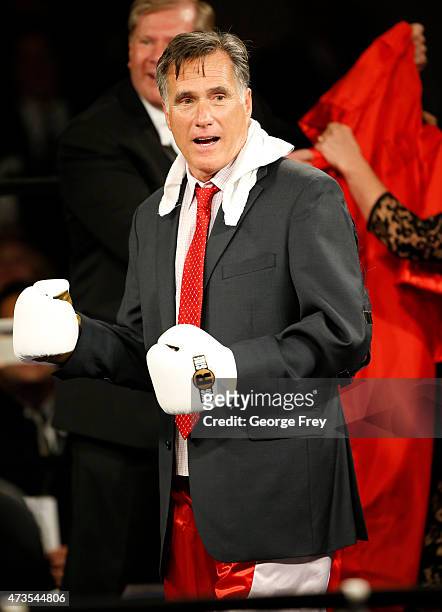 Mitt Romney appears in a suit to fight Evander Holyfield in a charity boxing event on May 15, 2015 in Salt Lake City, Utah. The event was held to...