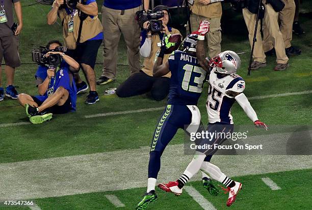 Chris Matthews of the Seattle Seahawks catches a pass over Kyle Arrington of the New England Patriots in the second quarter of Super Bowl XLIX...