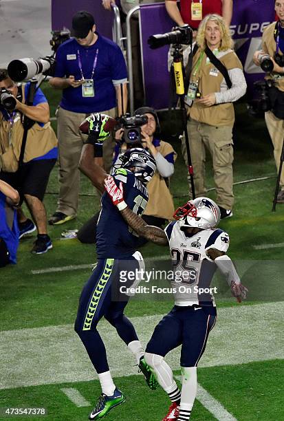 Chris Matthews of the Seattle Seahawks catches a pass over Kyle Arrington of the New England Patriots in the second quarter of Super Bowl XLIX...