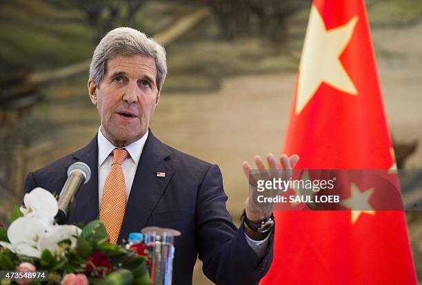 Secretary of State John Kerry speaks during a joint press conference following meetings with Chinese Foreign Minister Wang Yi at the Ministry of...