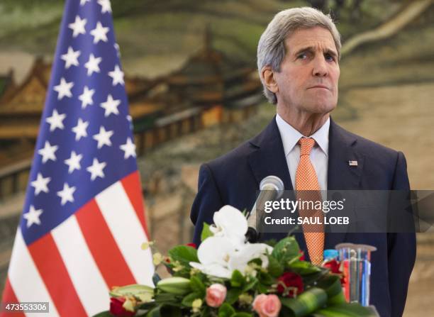 Secretary of State John Kerry speaks during a joint press conference following meetings with Chinese Foreign Minister Wang Yi at the Ministry of...