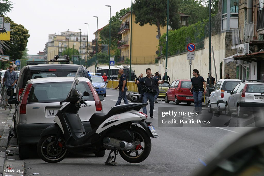 Policemen responding a shooting incident along Via...