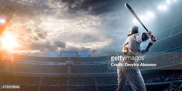 baseball-spieler im stadion - baseball bat stock-fotos und bilder