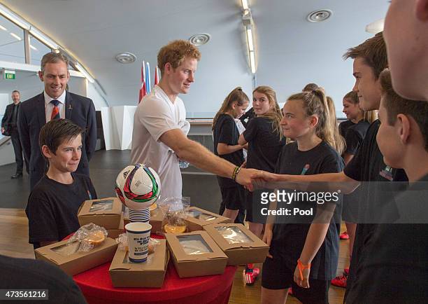 Prince Harry meets students at an event to promote the 2015 FIFA U-20 World Cup which will be hosted by New Zealand, at The Cloud on Auckland's...
