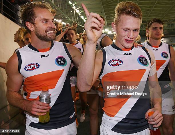 Joel Patfull of the Giants celebrates the win with Adam Treloar of the Giants during the round seven AFL match between the Carlton Blues and the...