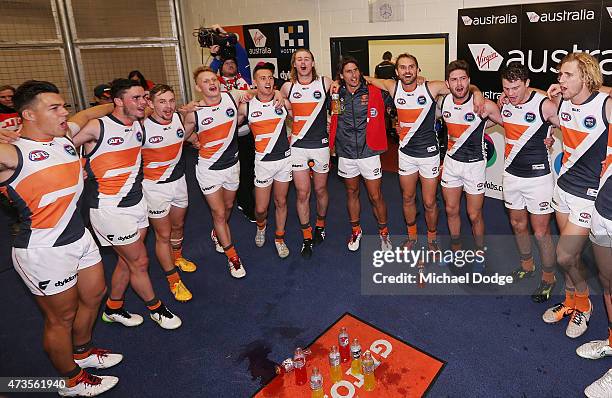 Giants players sing the club song after winning during the round seven AFL match between the Carlton Blues and the Greater Western Sydney Giants at...