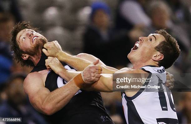 Jeremy Cameron of the Giants competes for the ball against Sam Rowe of the Blues during the round seven AFL match between the Carlton Blues and the...