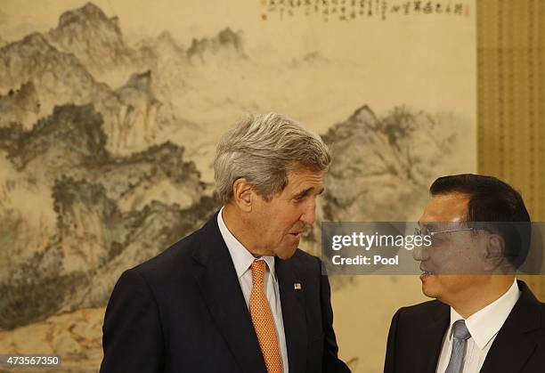 Secretary of State John Kerry speaks with Chinese Premier Li Keqiang at the Zhongnanhai Leadership Compound on May 16, 2015 in Beijing, China. U.S....