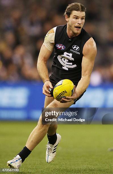 Bryce Gibbs of the Blues runs with the ball during the round seven AFL match between the Carlton Blues and the Greater Western Sydney Giants at...