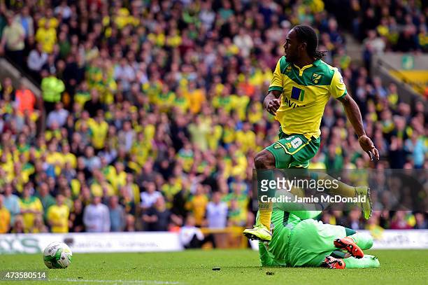 Cameron Jerome of Norwich City scores their third goal past goalkeeper Bartosz Bialkowski of Ipswich Town during the Sky Bet Championship Playoff...