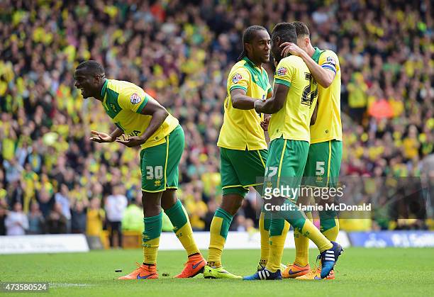 Cameron Jerome of Norwich City celebrates with team mates as he scores their third goal during the Sky Bet Championship Playoff semi final second leg...