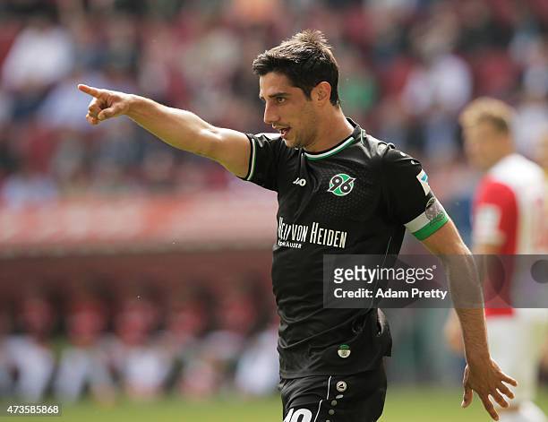 Lars Stindl of Hannover 96 celebrates after he scored the first goal during the Bundesliga match between FC Augsburg and Hannover 96 at SGL Arena on...