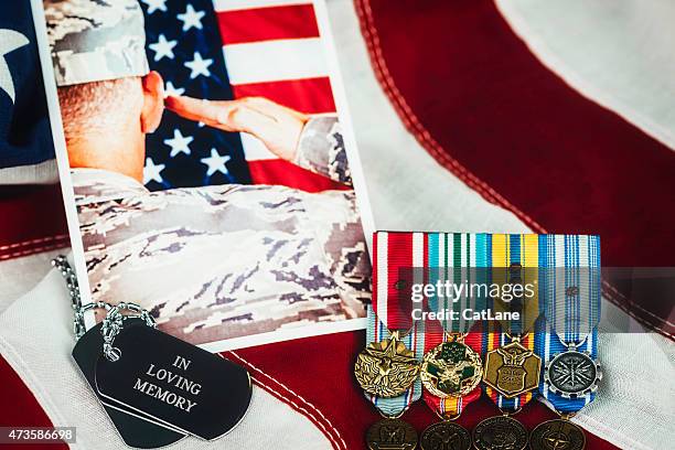 us memorial day. veterans day. military memorial with soldier. medals - us military emblems stock pictures, royalty-free photos & images