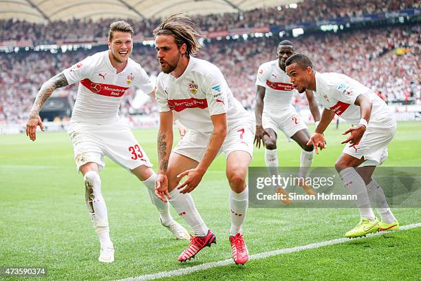 Martin Harnik of Stuttgart celebrates his team's second goal with his team mates Daniel Ginczek and Daniel Didavi during the Bundesliga match between...