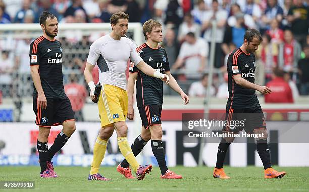Heiko Westermann of Hamburg, goalkeeper Rene Adler of Hamburg, Artjomas Rudnevs of Hamburg and Rafael van der Vaart of Hamburg show their...