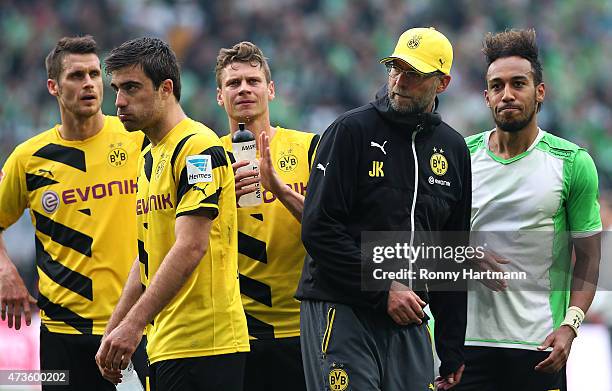 Sebastian Kehl, Sokratis, Lukasz Piszczek, head coach Juergen Klopp and Pierre-Emerick Aubameyang of Dortmund react after the Bundesliga match...