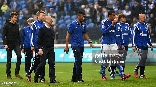 HEad coach Roberto di Matteo of Schalke walks with his players to the fans after the Bundesliga match between FC Schalke 04 and SC Paderborn at...