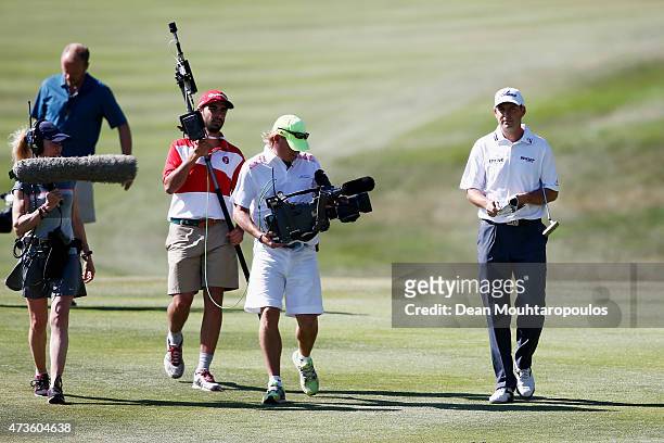 David Howell of England walks on the 18th fairway followed by a TV camera during Day 3 of the Open de Espana held at Real Club de Golf el Prat on May...