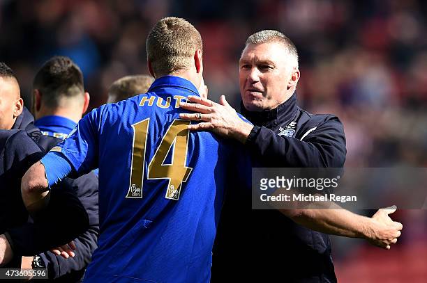 Robert Huth of Leicester City hugs Nigel Pearson, manager of Leicester City during the Barclays Premier League match between Sunderland and Leicester...