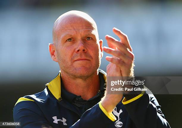 Brad Friedel of Spurs applauds the fans after the Barclays Premier League match between Tottenham Hotspur and Hull City at White Hart Lane on May 16,...