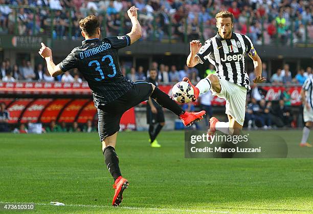 Claudio Marchisio of Juventus FC competes for the ball with Danilo D Amombrosio of FC Internazionale Milano during the Serie A match between FC...