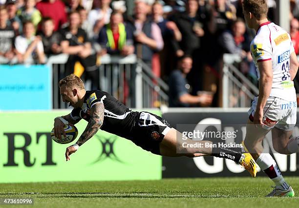 Byron McGuigan of Exeter dives over to score a try during the Aviva Premiership match between Exeter Chiefs and Sale Sharks at Sandy Park on May 16,...