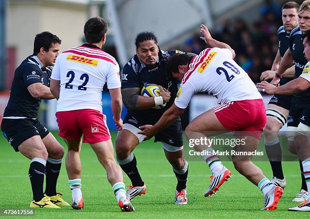 Alesana Tuilagi of Newcastle Falcons is tackled by Joe Trayfoot of Harlequins during Aviva Premiership match between Newcastle Falcons and Harlequins...