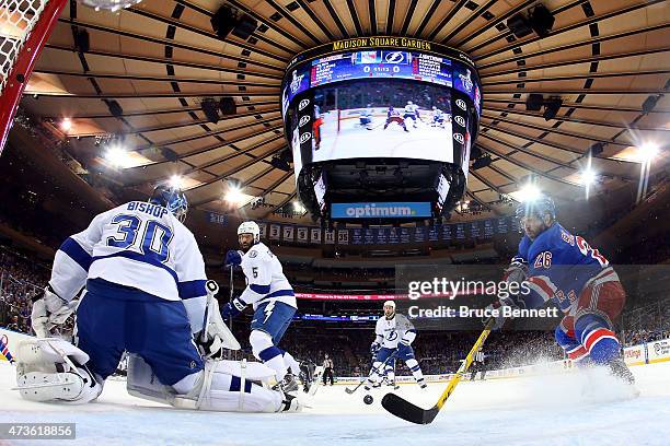 Martin St. Louis of the New York Rangers skates in on Ben Bishop of the Tampa Bay Lightning in the first period of Game One of the Eastern Conference...
