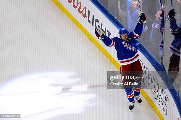 Derek Stepan of the New York Rangers celebrates a second period goal against the Tampa Bay Lightning in Game One of the Eastern Conference Finals...