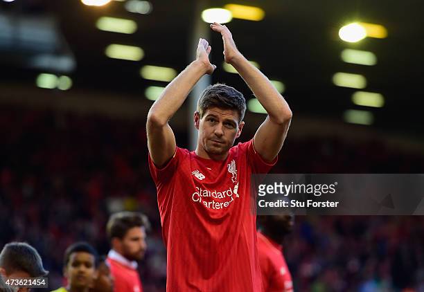 Steven Gerrard of Liverpool applauds the fans as he walks a lap of honour after his final game at Anfield during the Barclays Premier League match...