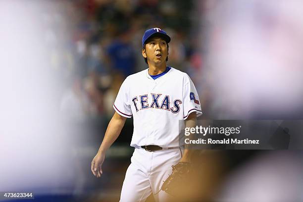 Kyuji Fujikawa of the Texas Rangers throws against the Cleveland Indians in the sixth inning at Globe Life Park in Arlington on May 15, 2015 in...