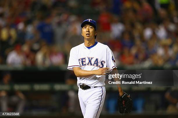 Kyuji Fujikawa of the Texas Rangers throws against the Cleveland Indians in the sixth inning at Globe Life Park in Arlington on May 15, 2015 in...