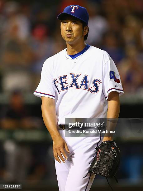 Kyuji Fujikawa of the Texas Rangers throws against the Cleveland Indians in the sixth inning at Globe Life Park in Arlington on May 15, 2015 in...