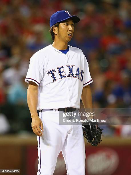 Kyuji Fujikawa of the Texas Rangers throws against the Cleveland Indians in the sixth inning at Globe Life Park in Arlington on May 15, 2015 in...