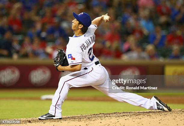 Kyuji Fujikawa of the Texas Rangers throws against the Cleveland Indians in the sixth inning at Globe Life Park in Arlington on May 15, 2015 in...