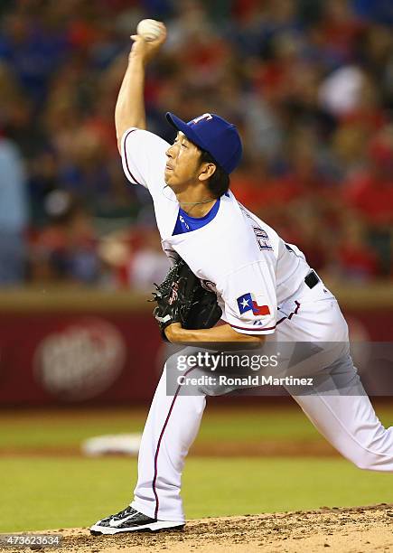 Kyuji Fujikawa of the Texas Rangers throws against the Cleveland Indians in the sixth inning at Globe Life Park in Arlington on May 15, 2015 in...