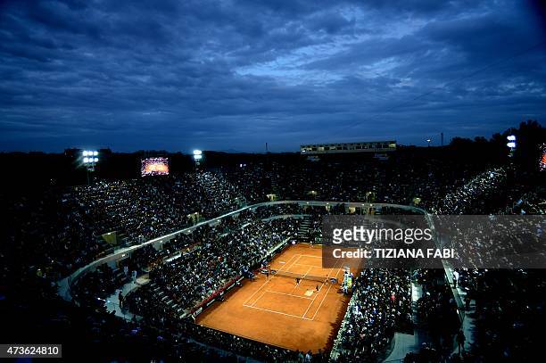 Tennis fans attend the semi final match between Roger Federer of Switzerland and compatriot Stan Wawrinka during the ATP Tennis Open at the Foro...