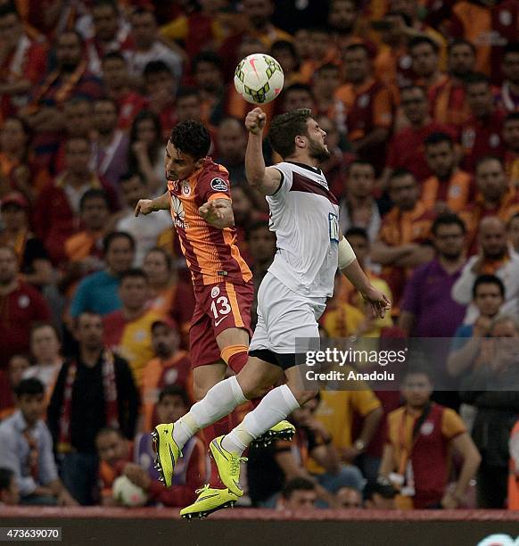 Alex Telles of Galatasaray in action against El Kabir of Genclerbirligi during the Turkish Spor Toto Super League football match between Galatasaray...